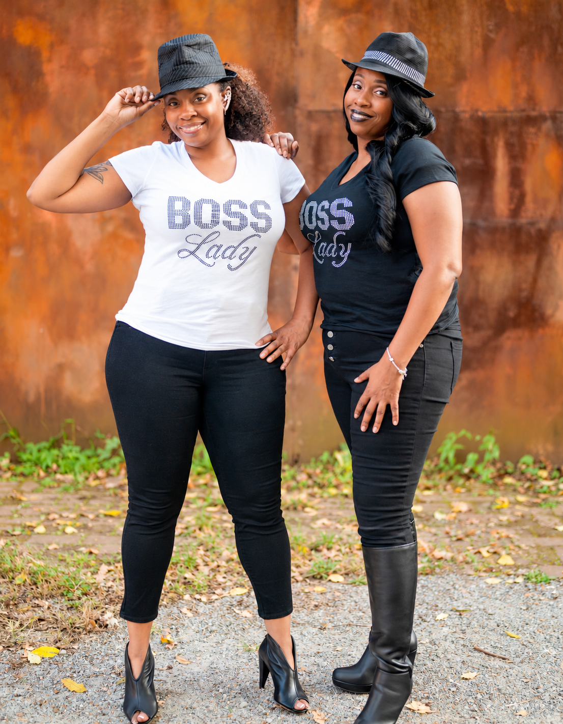 Tracey and Stacey L posing together outdoors in coordinated Boss Lady outfits